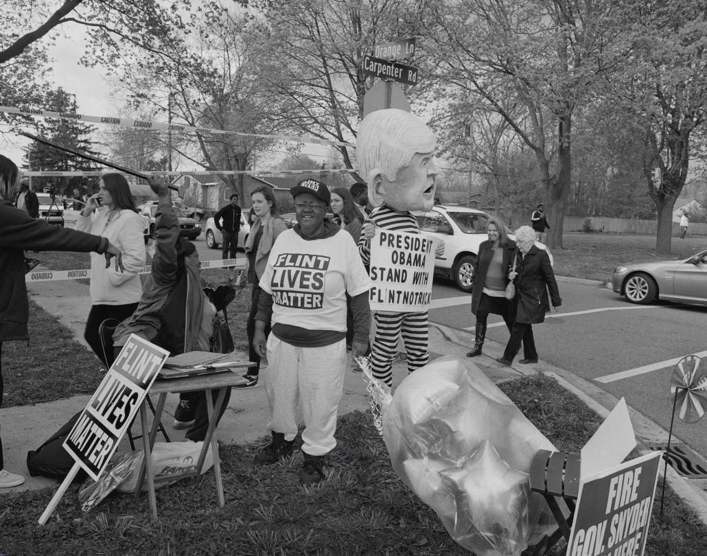 LaToya Ruby Frazier: Flint Students and Community Members Outside Northwestern High School (Est. 1964) Awaiting the Arrival of President Barack Obama, May 4, 2016, Flint, Michigan, III, 2016-17.